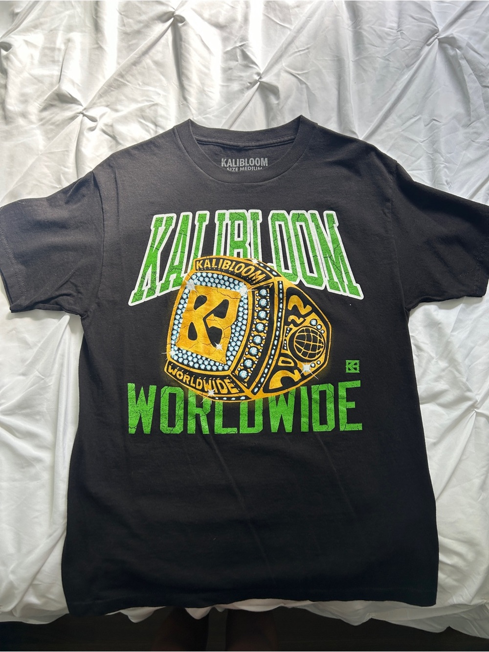 Kalibloom World Black Short-Sleeve Graphic Tee - Green & Gold Logo Ring Tshirt